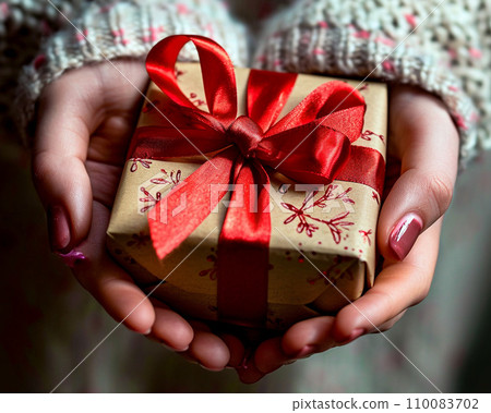 手遞紅絲帶的禮物盒 110083702