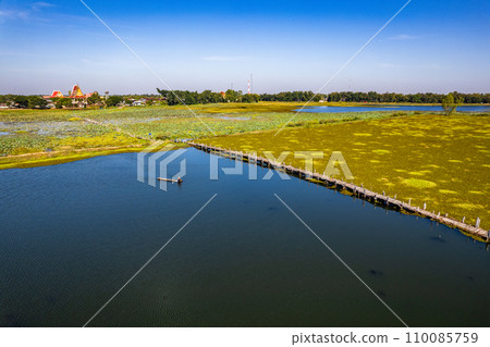 Gae Dam wooden bridge in Roi Et, Thailand Gae Dam wooden bridge in Roi Et, Thailand 110085759