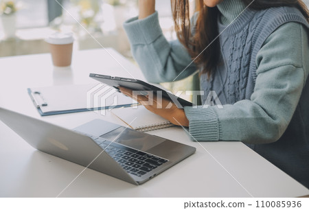 Real estate agent and customer discussing for contract to buy, get insurance or loan real estate or property. Real estate agent and customer discussing for contract to buy, get insurance or loan real estate or property. 110085936