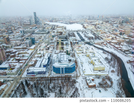 Yekaterinburg aerial panoramic view at Winter in cloudy day. Ekaterinburg is the fourth largest city in Russia located in the Eurasian continent on the border of Europe and Asia. 110086205