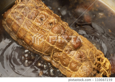 Boil Char Siu in a pot 110087239