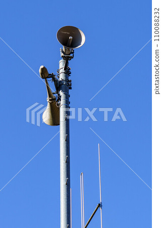 Disaster prevention radio against the blue sky 110088232