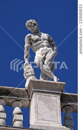 Statue at the top of National Library of St Mark`s Biblioteca Marciana, Venice, Italy Statue at the top of National Library of St Mark`s Biblioteca Marciana, Venice, Italy 110088813