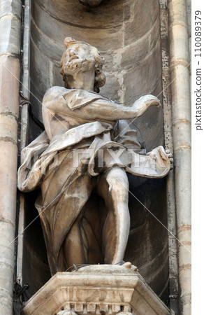 Statue of Saint on the facade of the Milan Cathedral, Duomo di Santa Maria Nascente, Milan, Lombardy, Italy 110089379