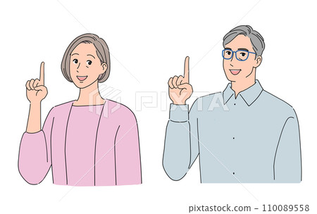 Senior couple pointing 110089558