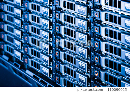 Row of hard drives serving as data storage inside server room 110090025