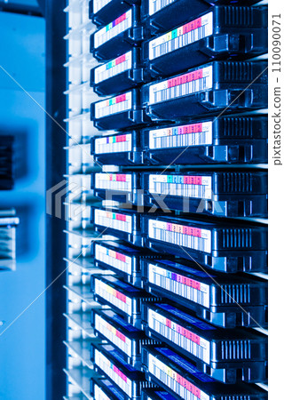 cluster of hard drives inside internet hosting center 110090071