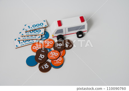 Image of medical expenses with ambulance and money 110090760