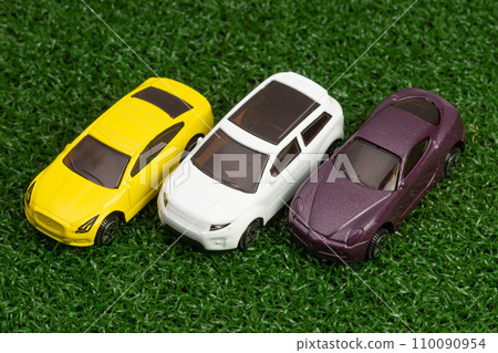 3 toy cars in a row 3 toy cars in a row 110090954