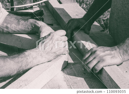the hands of the workers carpenters, joiners 110093035