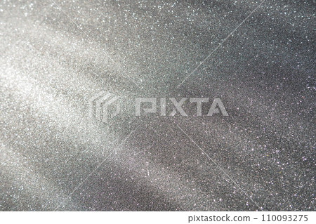 Oblique rays of light on a black surface. Bokeh, dust particles, reflection and magical glow. Festive shining background. New Year, Christmas, birthday. Plastic card design. Cosmic photons from space Oblique rays of light on a black surface. Bokeh, dust particles, reflection and magical glow. Festive shining background. New Year, Christmas, birthday. Plastic card design. Cosmic photons from space 110093275