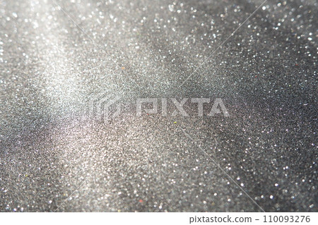 Oblique rays of light on a black surface. Bokeh, dust particles, reflection and magical glow. Festive shining background. New Year, Christmas, birthday. Plastic card design. Cosmic photons from space Oblique rays of light on a black surface. Bokeh, dust particles, reflection and magical glow. Festive shining background. New Year, Christmas, birthday. Plastic card design. Cosmic photons from space 110093276
