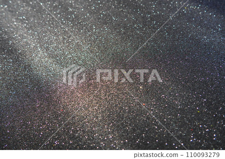 Oblique rays of light on a black surface. Bokeh, dust particles, reflection and magical glow. Festive shining background. New Year, Christmas, birthday. Plastic card design. Cosmic photons from space Oblique rays of light on a black surface. Bokeh, dust particles, reflection and magical glow. Festive shining background. New Year, Christmas, birthday. Plastic card design. Cosmic photons from space 110093279
