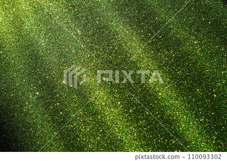 Rays warm green color gradient. Dusty light flash. Luxury, elegant beautiful background. Premium abstract backdrop. Shiny shimmering. Oblique light rays, photons and radiation. Divine rays from space. 110093302