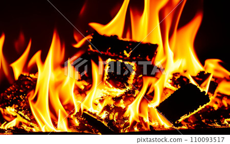 Fire lights on a black background. Fireballs in the night. A burning fire or fire. Danger from fire. The work of a fakir. Fire lights on a black background. Fireballs in the night. A burning fire or fire. Danger from fire. The work of a fakir. 110093517