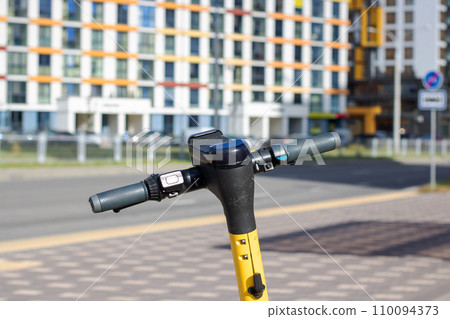 Steering wheel of electric scooter background of city 110094373