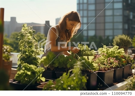 A young woman in the roof garden 110094770