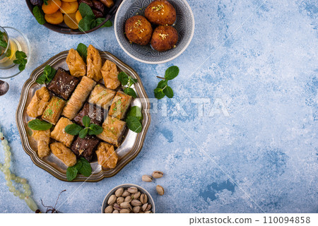 Ramadan iftar traditional desserts baklava and dates 110094858