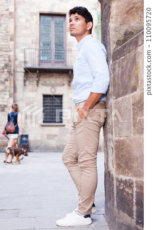 Man posing in gothic quarter of Barcelona 110095720