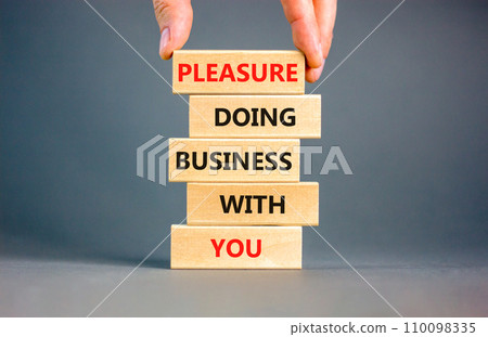 Pleasure doing business with you symbol. Concept words Pleasure doing business with you on wooden blocks. Beautiful grey table grey background. Pleasure doing business with you concept. Copy space. Pleasure doing business with you symbol. Concept words Pleasure doing business with you on wooden blocks. Beautiful grey table grey background. Pleasure doing business with you concept. Copy space. 110098335