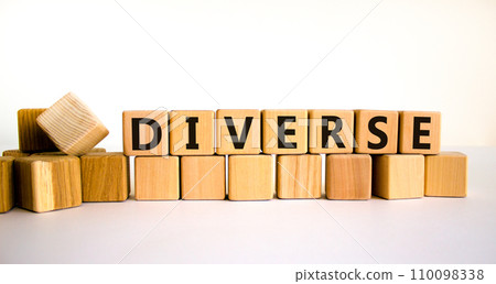 Diverse and diversity symbol. The concept word Diverse on wooden cubes. Beautiful white table, white background, copy space. Business diversity and diverse concept. Diverse and diversity symbol. The concept word Diverse on wooden cubes. Beautiful white table, white background, copy space. Business diversity and diverse concept. 110098338