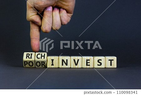 Rich or poor invest symbol. Businessman turns cubes and changes words poor invest to rich invest. Beautiful grey table, grey background, copy space. Business and rich or poor invest concept. Rich or poor invest symbol. Businessman turns cubes and changes words poor invest to rich invest. Beautiful grey table, grey background, copy space. Business and rich or poor invest concept. 110098341