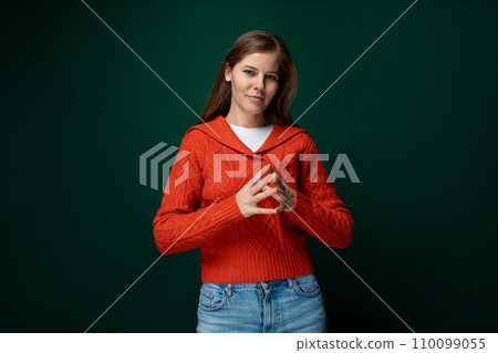 Successful Caucasian woman with brown straight hair on green background Successful Caucasian woman with brown straight hair on green background 110099055