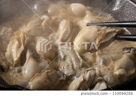 Oysters grilled in butter and soy sauce Oysters grilled in butter and soy sauce 110099288
