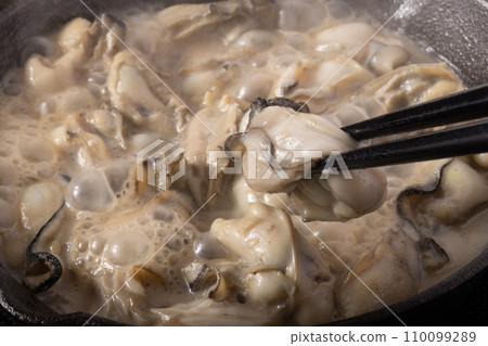 Oysters grilled in butter and soy sauce Oysters grilled in butter and soy sauce 110099289