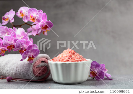 Beautiful blooming orchid flowers and pink sea salt. Beautiful blooming orchid flowers and pink sea salt. 110099661