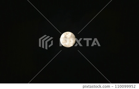 full moon floating on dark sky in night full moon floating on dark sky in night 110099952