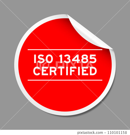 Red color peel sticker label with word ISO 13485 certified on gray background Red color peel sticker label with word ISO 13485 certified on gray background 110101158