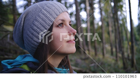 Young African American teenage hiker has snack in the forest 110101963