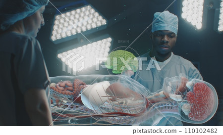 African American doctor talks with colleague, uses virtual holographic display 110102482