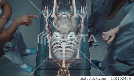 Multiethnic surgical team work in operating room using holographic display Multiethnic surgical team work in operating room using holographic display 110102499