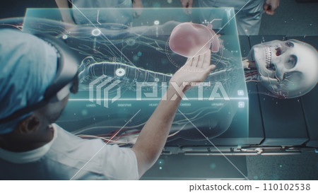 Surgical team perform virtual heart surgery using holographic display Surgical team perform virtual heart surgery using holographic display 110102538
