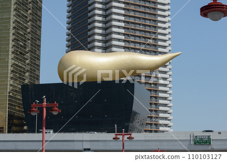 Golden Flame Sculpture Amidst Asakusa's Urban Architecture, Tokyo Golden Flame Sculpture Amidst Asakusa's Urban Architecture, Tokyo 110103127