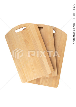 Three wooden cutting boards isolated on a white background. 110103372