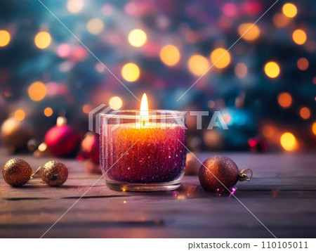 Candle burning on Christmas decor background. 110105011