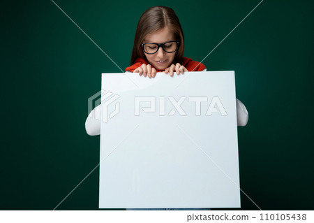 Smart young woman showing billboard for business records 110105438