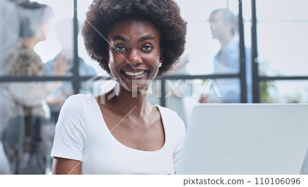 business woman with her staff in background at office business woman with her staff in background at office 110106096
