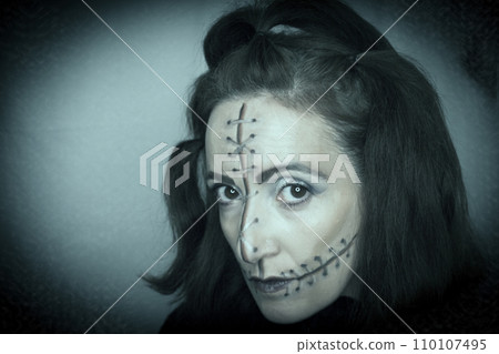 Halloween makeup doll with stitches on the face 110107495