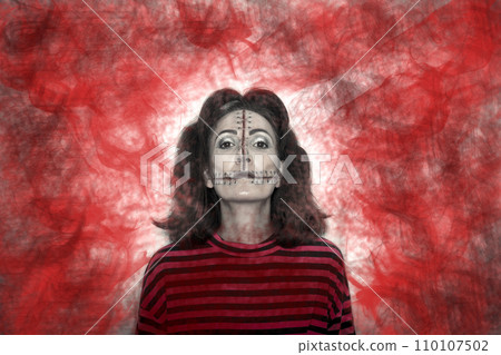 Halloween makeup doll with stitches on the face Halloween makeup doll with stitches on the face 110107502