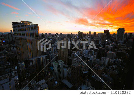 Osaka City, Chuo Ward, Tanimachisuji at dusk, Osaka's twilight view from a tower apartment, orange sunset Osaka City, Chuo Ward, Tanimachisuji at dusk, Osaka's twilight view from a tower apartment, orange sunset 110110282
