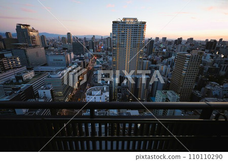 Osaka City, Chuo Ward, Tanimachisuji at dusk, Osaka's twilight view from a tower apartment, orange sunset Osaka City, Chuo Ward, Tanimachisuji at dusk, Osaka's twilight view from a tower apartment, orange sunset 110110290