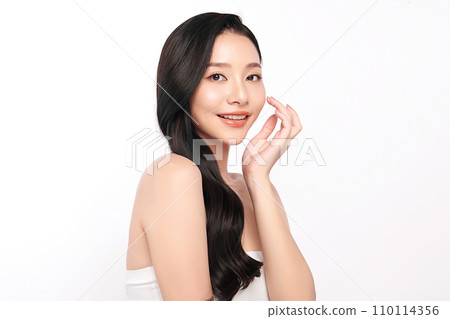 Beautiful young asian woman with clean fresh skin on white background, Face care, Facial treatment, Cosmetology, beauty and spa, Asian women portrait. Beautiful young asian woman with clean fresh skin on white background, Face care, Facial treatment, Cosmetology, beauty and spa, Asian women portrait. 110114356