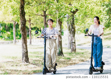 Women's trip: A woman sightseeing on an electric kickboard 110115531