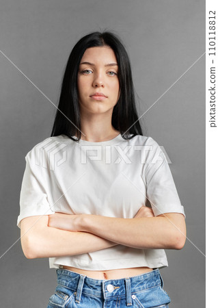 Portrait of a young girl who looks sad. 110118812