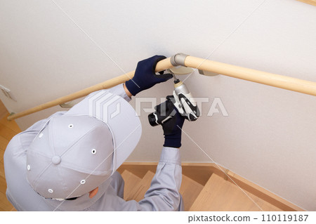 Installation of handrails on stairs, construction site Installation of handrails on stairs, construction site 110119187