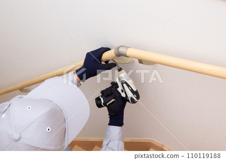 Installation of handrails on stairs, construction site 110119188